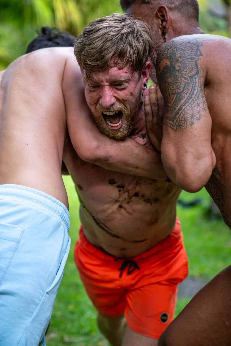 Men in the garden in a physical practice