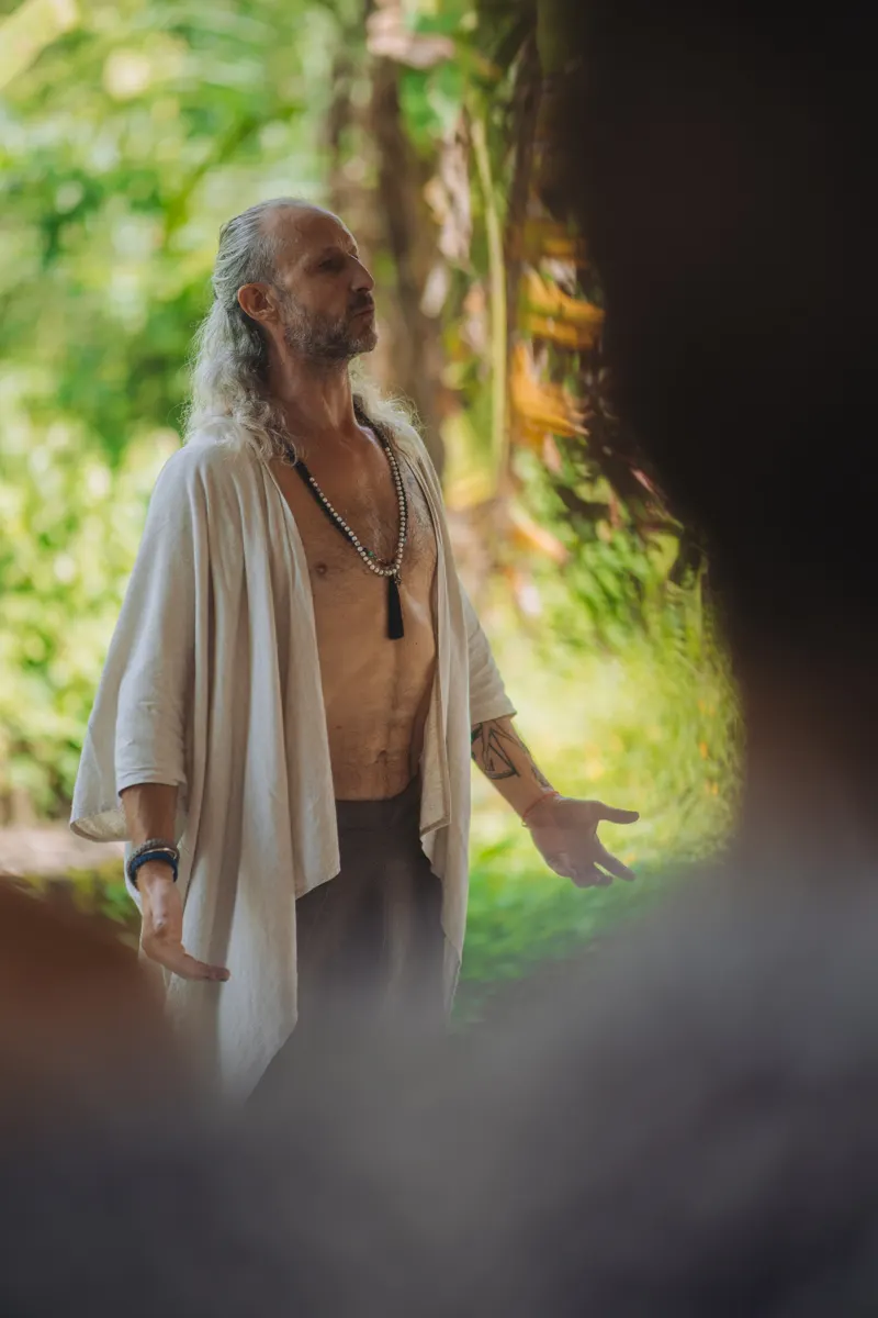 Steve in white, holding the space