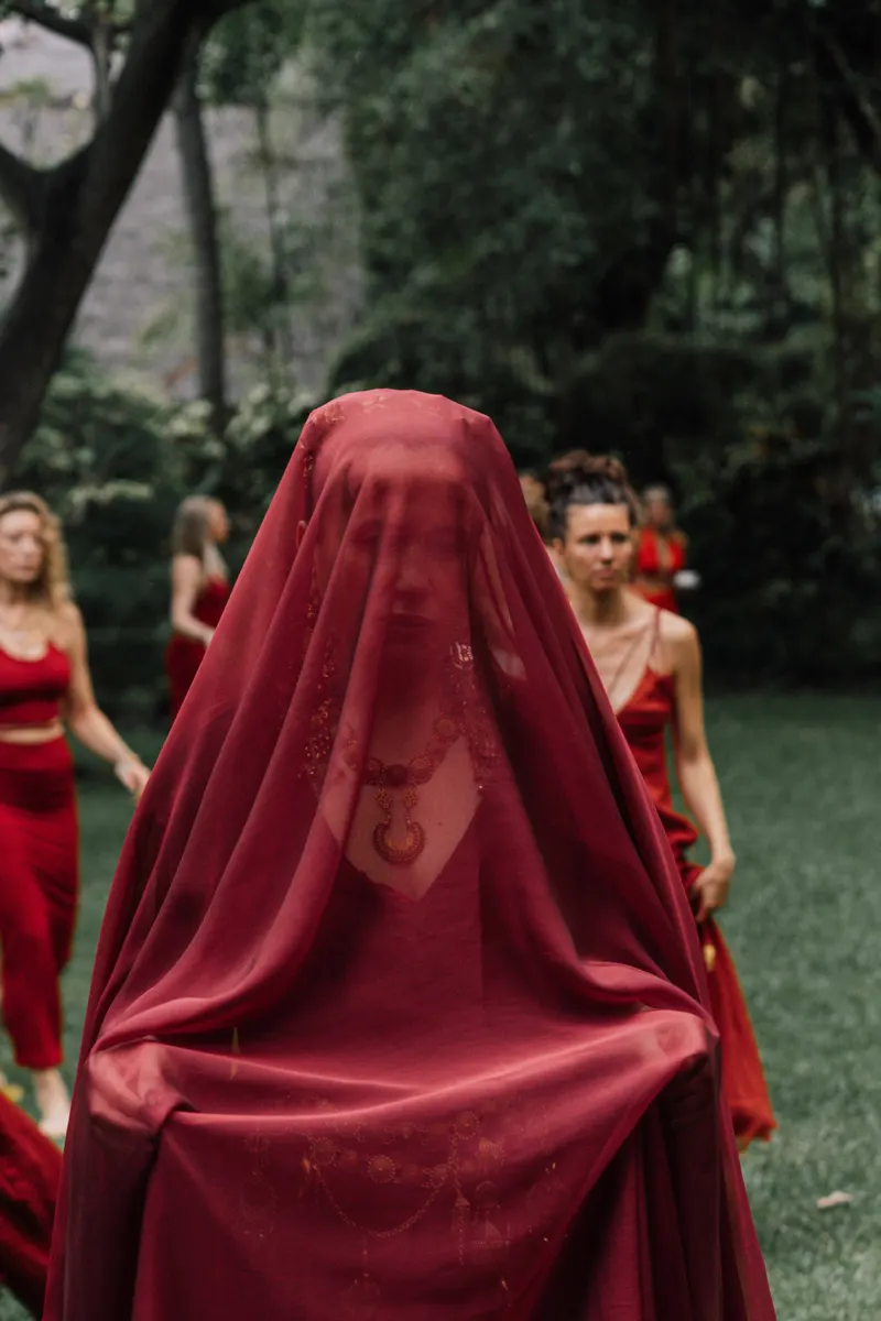 A veiled woman of the Initiatress
