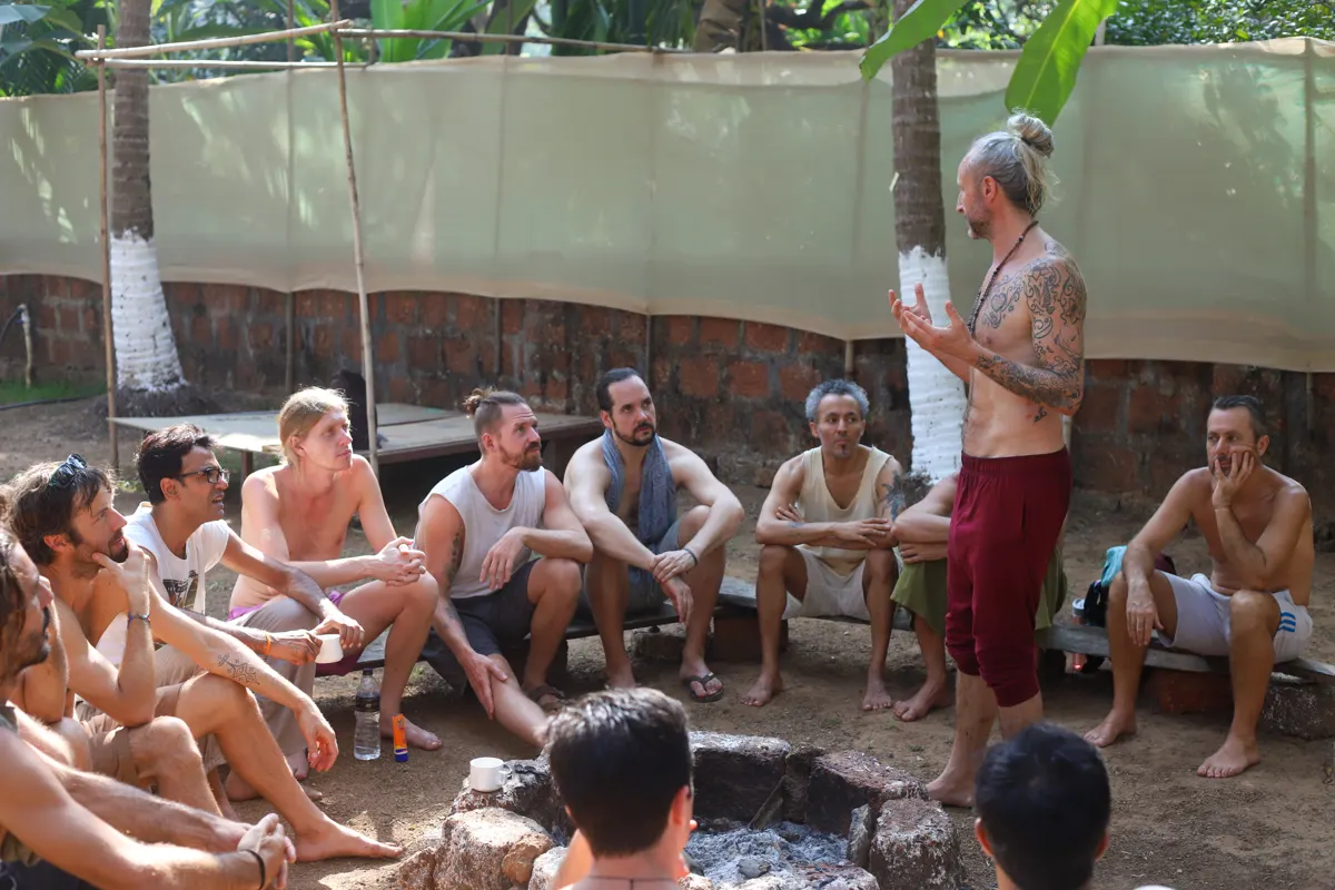 Steve teaching the men outdoors