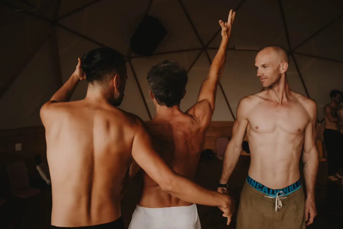 The men with arms raised