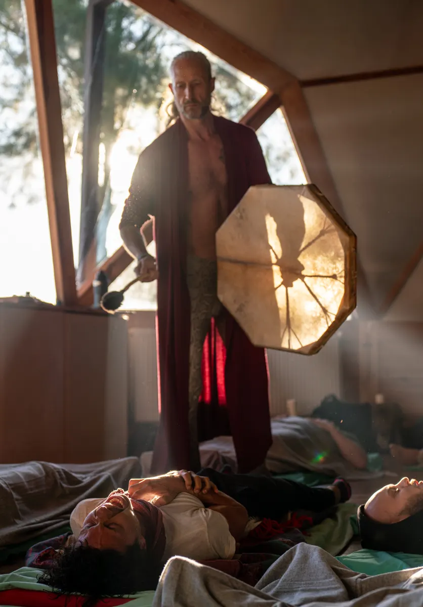 The drum over the men lying in the dome